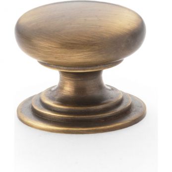 Waltz Round Kitchen Cupboard Knob on Stepped Rose 25mm in Antique Brass - by Alexander & Wilks - AW825-25-AB