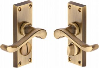 Bedford V825-AT scroll privacy set handles antique brass