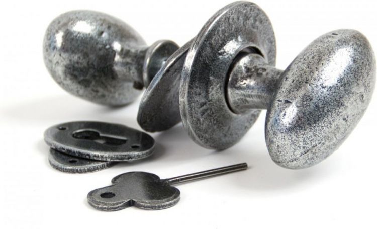 From The Anvil Oval Escutcheon & Cover – Pewter Patina Finish – Stops Drafts, Protects Door From Key Damage